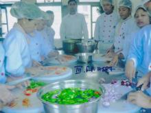 Students are chopping vegetables